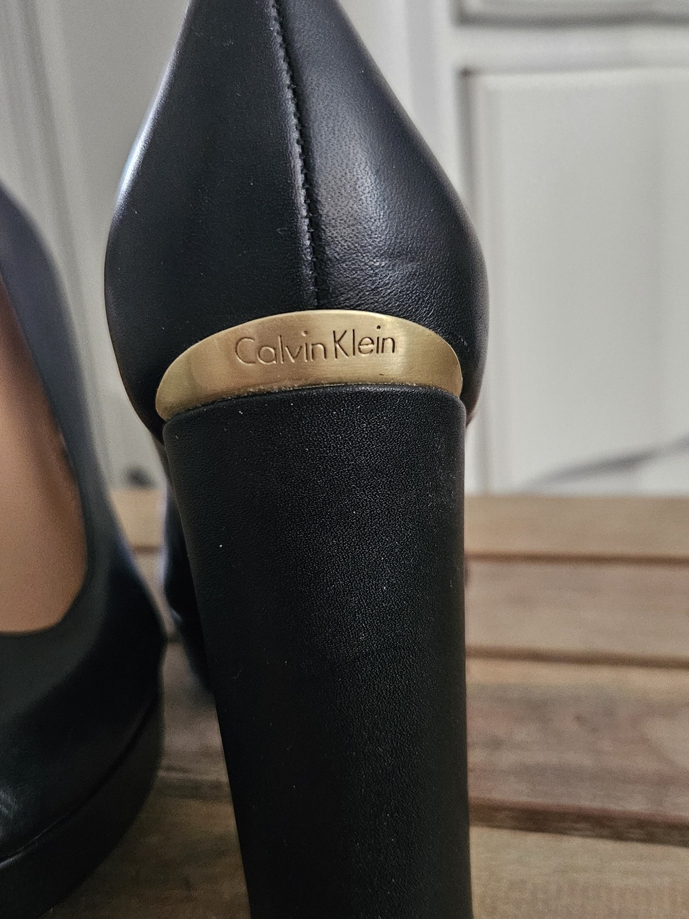 Calvin Klein Black Leather Block Heel Pumps with Gold Logo Accent